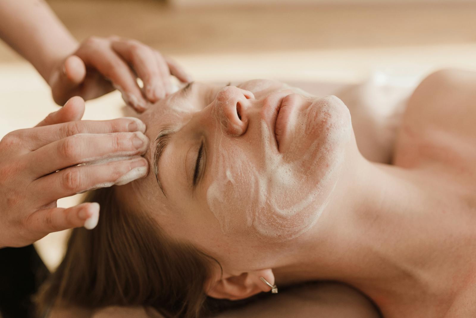 Facial massage treatment in a calm spa room